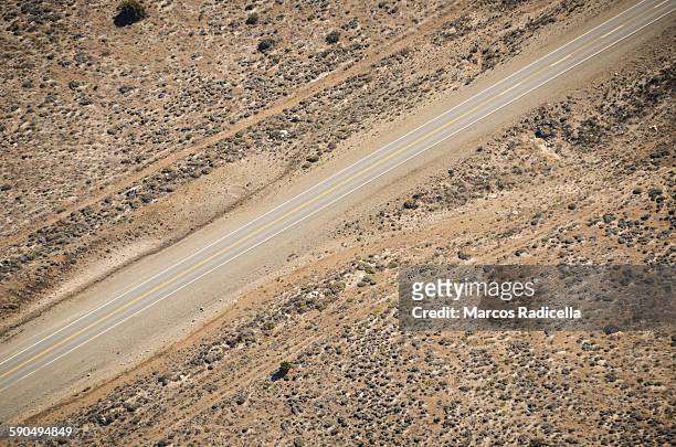 route in the steppe from the air - semi arid stock pictures, royalty-free photos & images