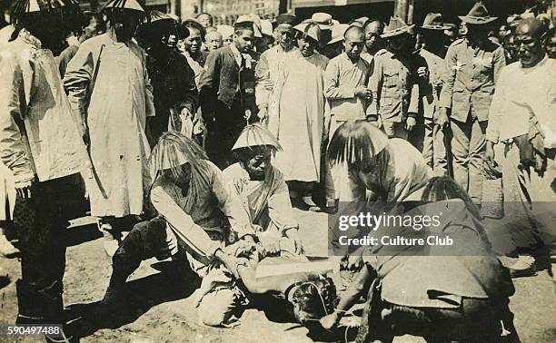 Execution by beheading, China, early 20th century. Decapitated