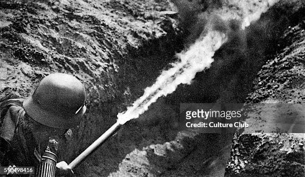 German soldier with flamethrower clears trench. German postcard, Wehrmacht-Bildserie / German armed forces series.