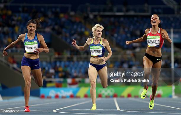 Jenna Prandini of the United States, Natalia Pohrebniak of Ukraine and Ivet Lalova-Collio of Bulgaria compete during the Women's 200m Semifinals on...