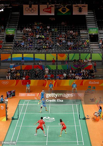 Yunlei Zhao and Nan Zhang of China take on Chen Xu and Jin Ma of China during the bronze medal Mixed Doubles match on Day 11 of the Rio 2016 Olympic...