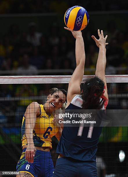 Thaisa Menezes of Brazil pikes the ball during the Women's Quarterfinal match between China and Brazil on day 11 of the Rio 2106 Olympic Games at the...