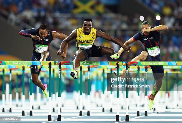 Omar Mcleod of Jamaica competes on his way to winning the gold medal in the Men's 110m Hurdles Final ahead of silver medalist Orlando Ortega of Spain...