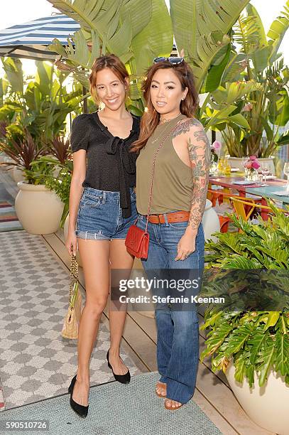 Rachel Nguyen and Claire Marshall attend LOFT and Yes Way Rose Celebrate Summer In LA at Mama Shelter on August 16, 2016 in Los Angeles, California.