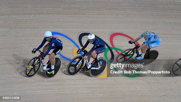 Laura Trott of Great Britain, Jolien D'Hoore of Belgium and Sarah Hammer of the United States compete during the Women's Omnium Points race on Day 11...