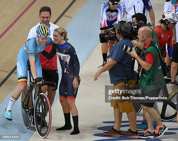 Laura Trott of Great Britain with Jolien D'Hoore of Belgium after the Women's Omnium Points race on Day 11 of the Rio 2016 Olympic Games at the Rio...