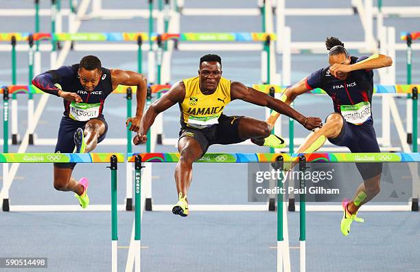 Omar Mcleod of Jamaica competes on his way to winning the gold medal in the Men's 110m Hurdles Final ahead of silver medalist Orlando Ortega of Spain...