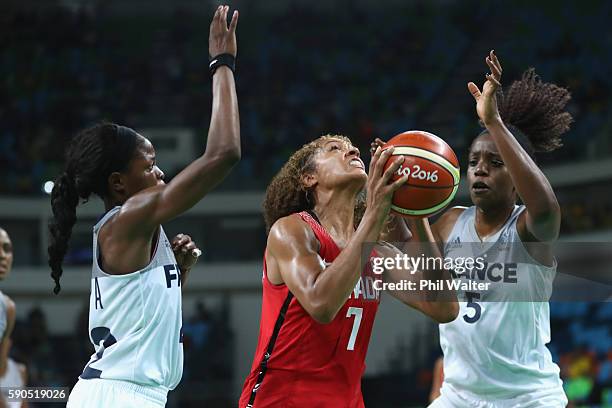 Nayo Raincock-Ekunwe of Canada shoots during the Women's Quarterfinal match between France and Canada at Carioca Arena 1 on August 16, 2016 in Rio de...