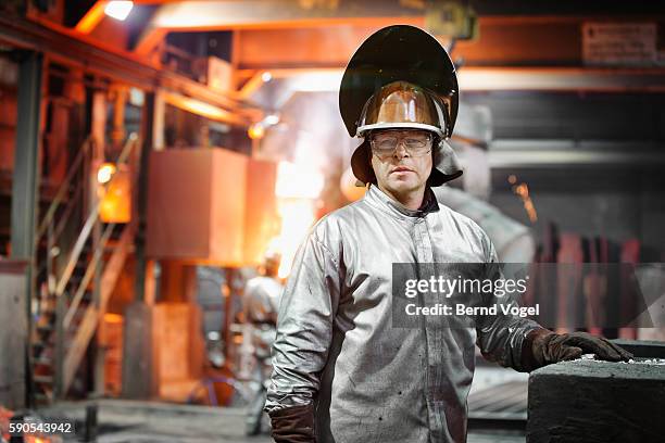steel worker - industrial laborer foto e immagini stock