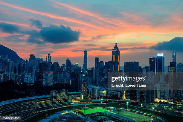 sunset at happy valley, hong kong - hong kong racing stock pictures, royalty-free photos & images