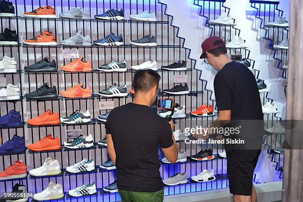 Atmosphere at the Grand Opening of the Adidas Originals Soho Flagship Store on August 16, 2016 in New York City.