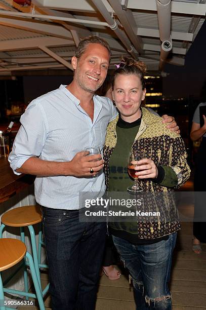 Shawn Buchanan and Sarah Schussheim attend LOFT and Yes Way Rose Celebrate Summer In LA at Mama Shelter on August 16, 2016 in Los Angeles, California.