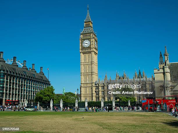 big ben also known as elizabeth tower against blue sky on sunny day without clouds. - parliament square fotografías e imágenes de stock