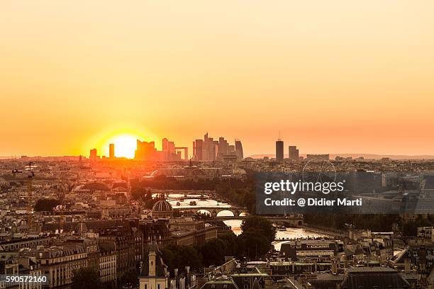 sunset over paris in france - place charles de gaulle stock pictures, royalty-free photos & images