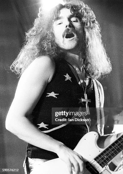 Geezer Butler of Black Sabbath performing on stage at Rainbow Theatre, London 16 March 1973.