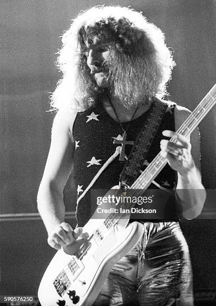Geezer Butler of Black Sabbath performing on stage at Rainbow Theatre, London 16 March 1973.