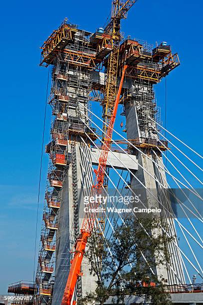 cable-stayed bridge construction in rio - cable stayed bridge stock-fotos und bilder