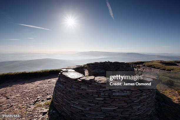 stone windbreak on mountain top - wind shelter stock pictures, royalty-free photos & images