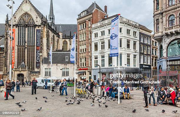 dam square amsterdam - dam square stock pictures, royalty-free photos & images