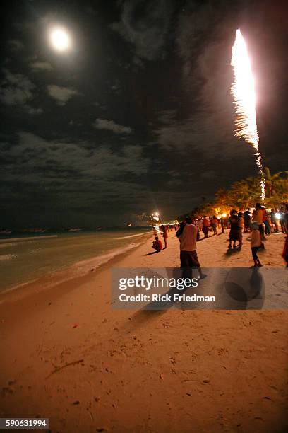 New Year's eve fireworks over the beach in Boracay, Philippines. Borcay is a 4 km beach community where the main street is a strip of sand along the...