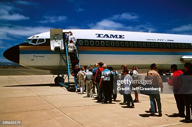 Ecuador, Galapagos, Baltra Island, Passengers Boarding Tame Airliner.