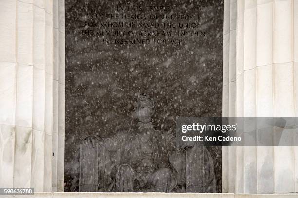 The Lincoln Monument is slightly visible through the snow mid afternoon as snow fell Thursday, March 5, 2014. The Federal Office of Personal and...