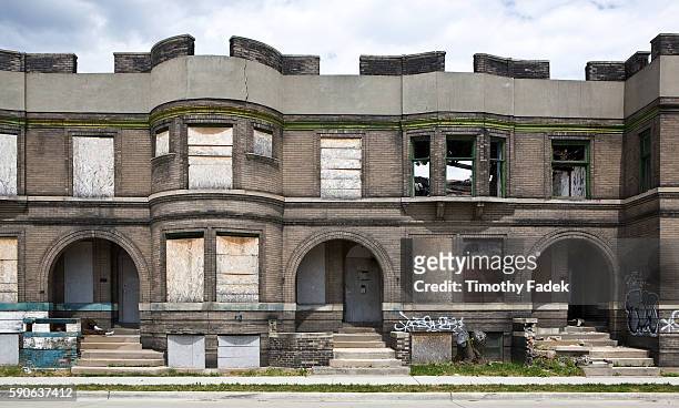 An abandoned apartment building. The decades-long decline of the U.S. Automobile industry is acutely reflected in the urban decay of Detroit, the...