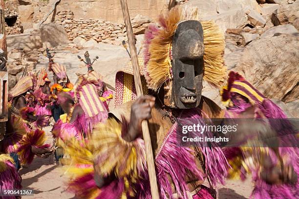 Dancers wearing Kananga masks perform at the Dama celebration in Tireli, Mali.