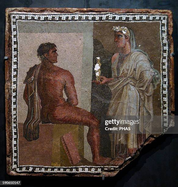 Roman Art. Mosaic depicting Orestes and Iphigenia who holds in her hands the statuette of Artemis. Stone on terracotta. 2nd-3rd centuries A.C....