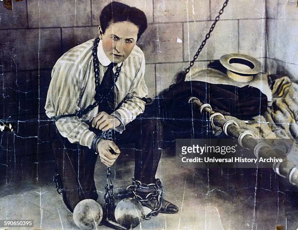Tone walls and chains do not make a prison for Houdini. Houdini followed his performance in "The master mystery" with the "Grim game," the first of...
