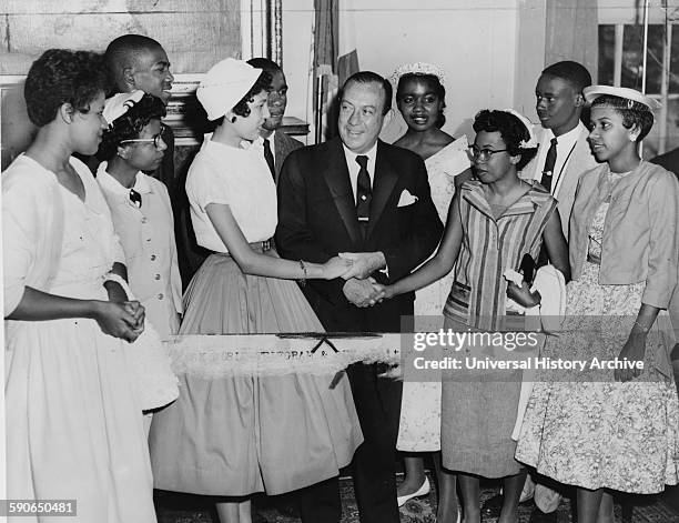 New York City Mayor Robert Wagner greeting the teenagers who integrated Central High School, Little Rock, Arkansas. Pictured, front row, left to...
