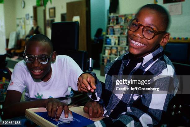 New Jersey, East Orange, Cerebral Palsy Center, Developmentally Disabled Teen Boys Smiling.