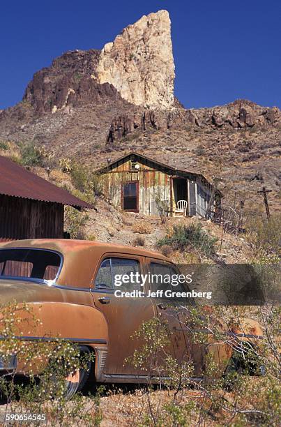 Arizona, Oatman, Mining Town With Cabins And Black Mountains Beyond.