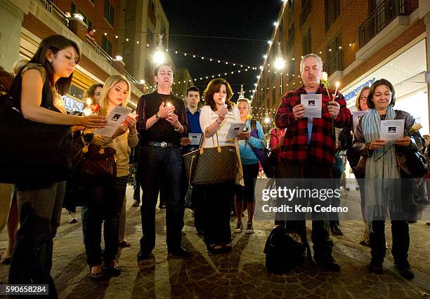 Friends gather for a candlelight vigil held in Bethesda, MD near Lululemon where their friend Jayna Murray was killed March 11, 2011. Photo Ken Cedeno