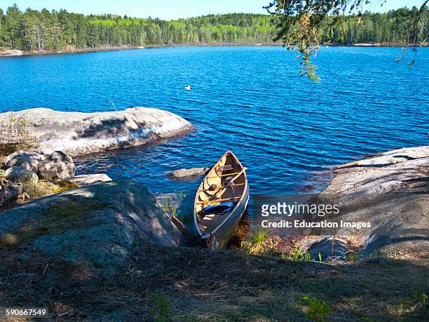 Ontario, Quetico Park, Lake Kawnipi, wilderness, Beached Canoe.