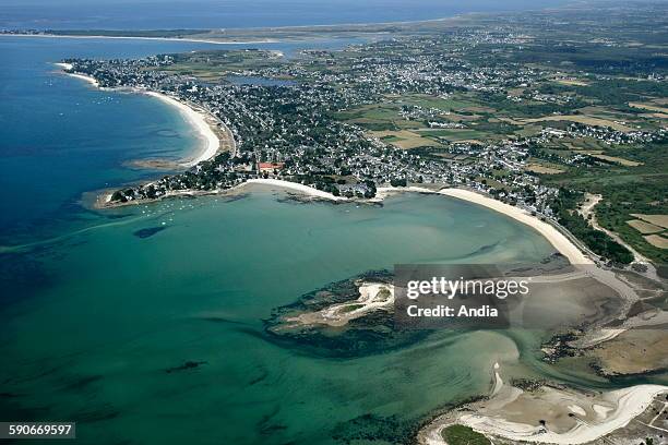 Aerial view over Carnac, in the background, the beach "Plage du Men" in the town of La Trinite-sur-Mer, the "Pointe Churchill" headland and the great...