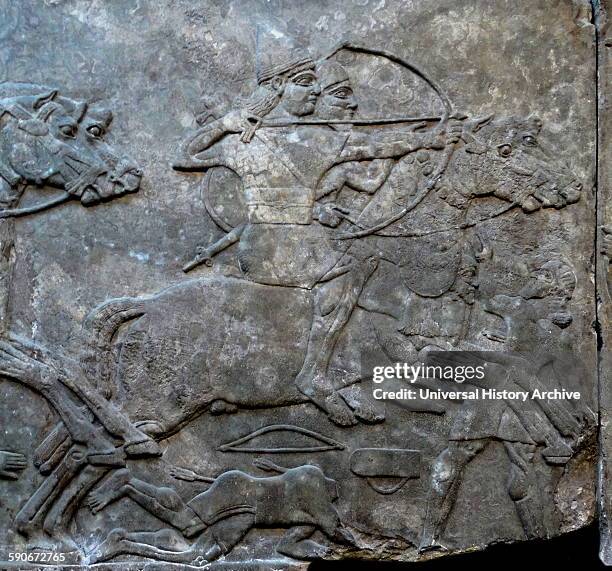 Assyrian Battle scene 865-860 BC, From Nimrud, Iraq, North-West Palace, Room B, panel 9. Assyrian cavalry charge the enemy.