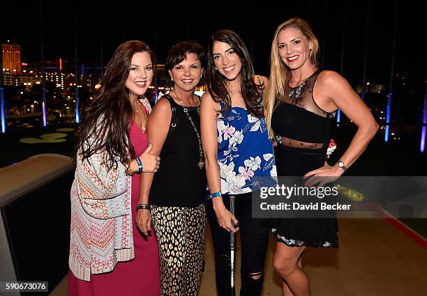 Golf Channel television personality Bailey Mosier, designer Tricia Covel, singer Krystal Sandubrae and Shelley Covel attend the debut of SWINGDISH...