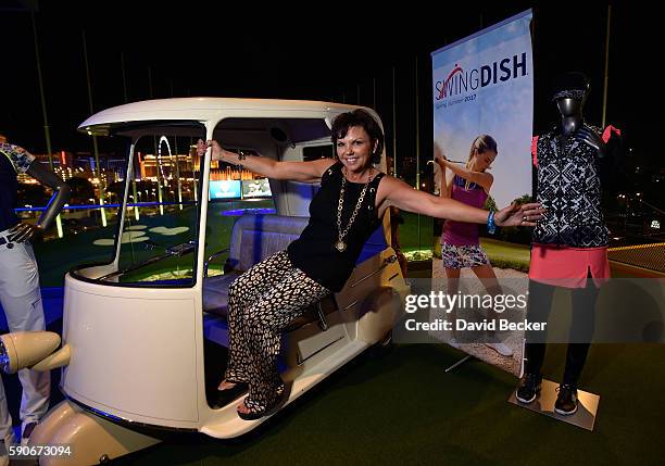 Designer Tricia Covel attends the debut of her SWINGDISH women's golf apparel 2017 spring/summer collection during the PGA show at Topgolf Las Vegas...