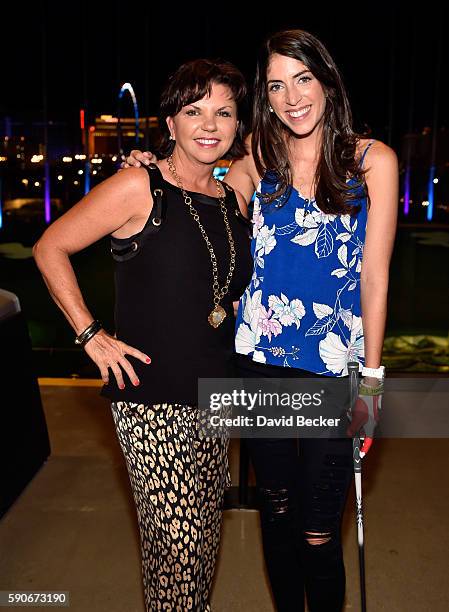 Designer Tricia Covel and Golf Channel television personality Bailey Mosier attend the debut of SWINGDISH women's golf apparel 2017 spring/summer...