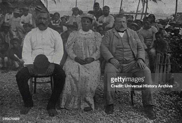 Prime Minister of New Zealand Richard Seddon and wife Mrs. Seddon with the King and Queen of Mangaia. Dated 1900.