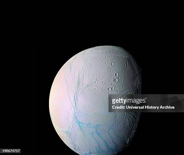 Photograph showing the cracks in Saturns moon, Enceladus, taken by the Cassini spacecraft. Dated 2005.