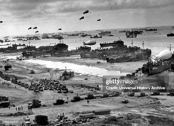 Photograph of D-Day landing craft, boats and seagoing vessels used to convey a landing force from the sea to the shore during an amphibious assault,...