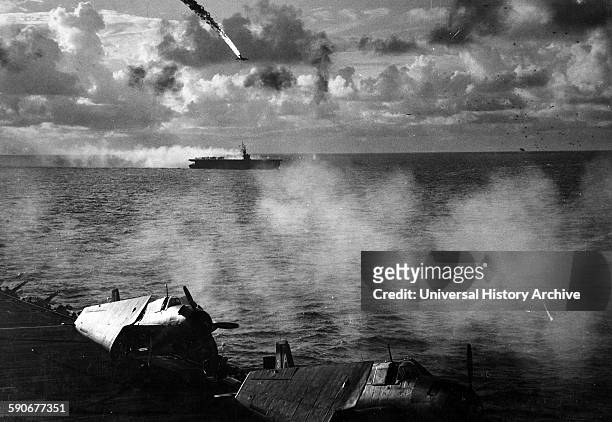 Japanese plane is shot down while attempting a suicide attack on the USS Kitkun Bay 1 January 1945.