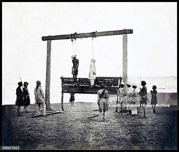 Two rebels hanging from a gallows where they were executed following the British suppression of the Indian Rebellion of 1857, Lucknow, Uttar Pradesh,...