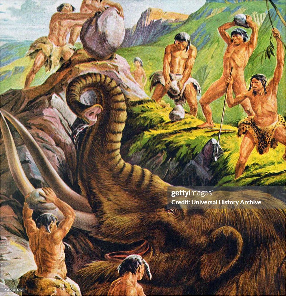 Pre-historic cavemen hunt a Mastodon.