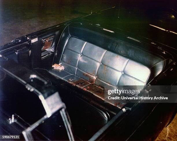 Photograph of the Kennedy limousine after assasination, Dallas. Dated 1963.