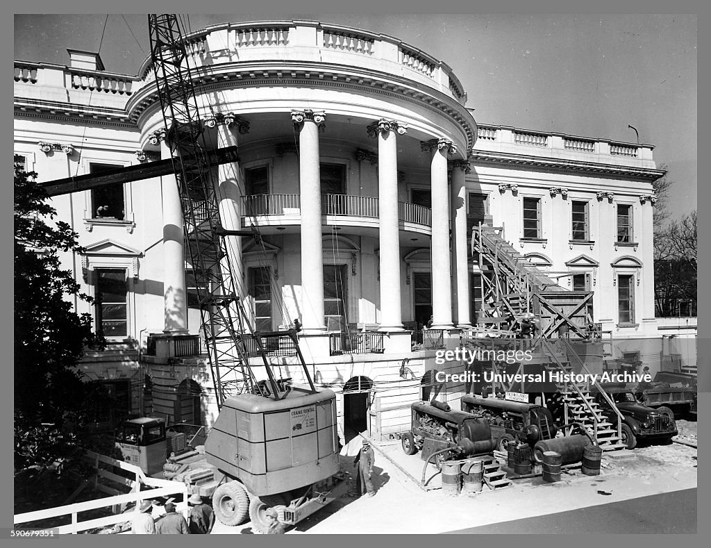 Construction equipment outside the White House during major renovation.