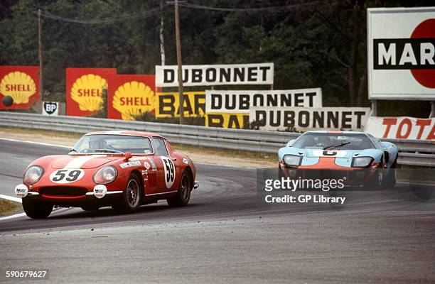 Jacques Rey Claude Haldi Ferrari 275 GTB, 6 Ford GT40 Gulf JW team car of Jacky ickx and Jackie Oliver which won the race, at Mulsanne Corner, 15th...