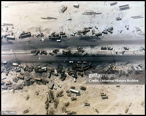 Photograph of the 'Highway of Death', the result of American forces bombing retreating Iraqi forces, Kuwait, 1991.